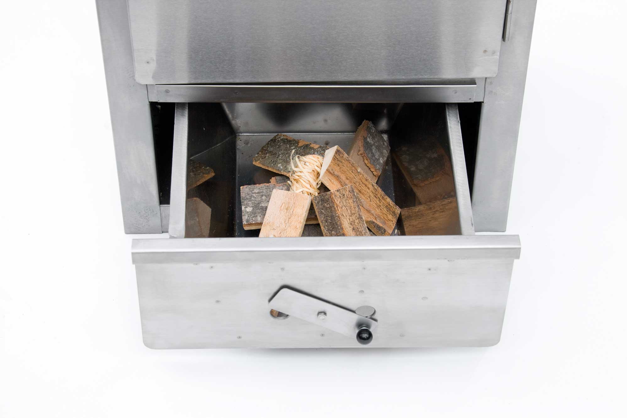 Holzfeuerungsschublade für FS1 Holzfeuerungsschublade aus Edelstahl gefüllt mit Holz