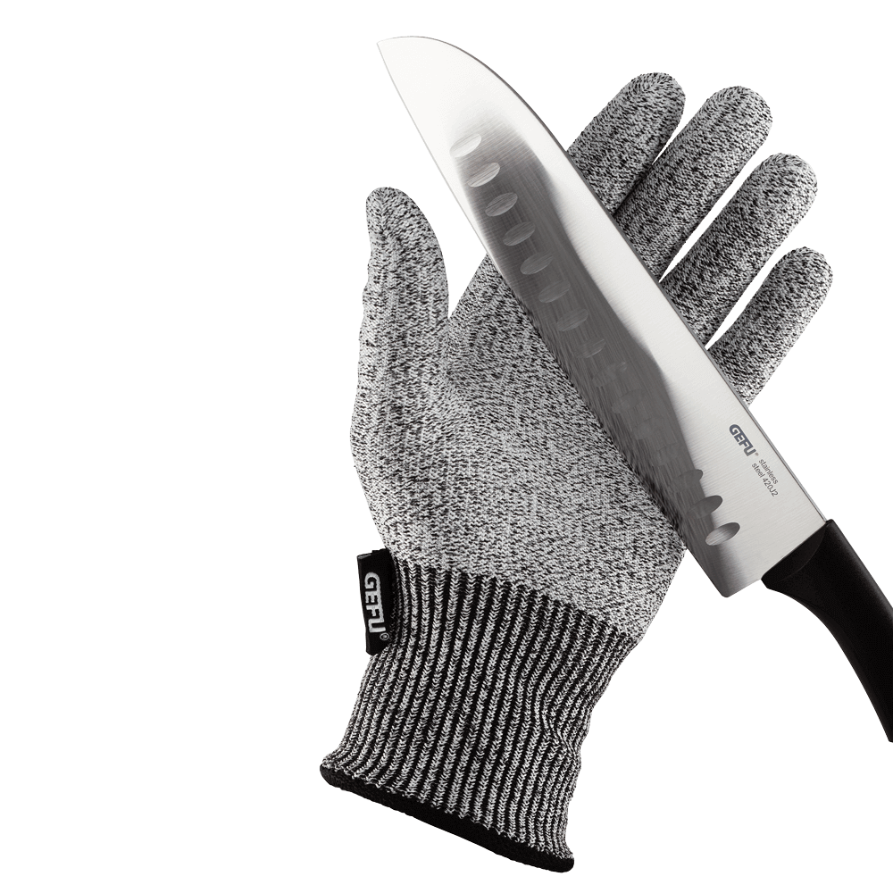 Schnittschutzhandschuh Schnittschutzhandschuh mit scharfem Messer in der Handfläche ohne Hintergrund.