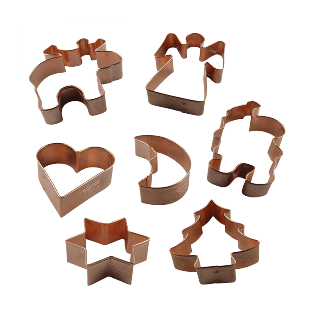 Sieben verschiedene Kupferausstecherformen ohne Hintergrund.