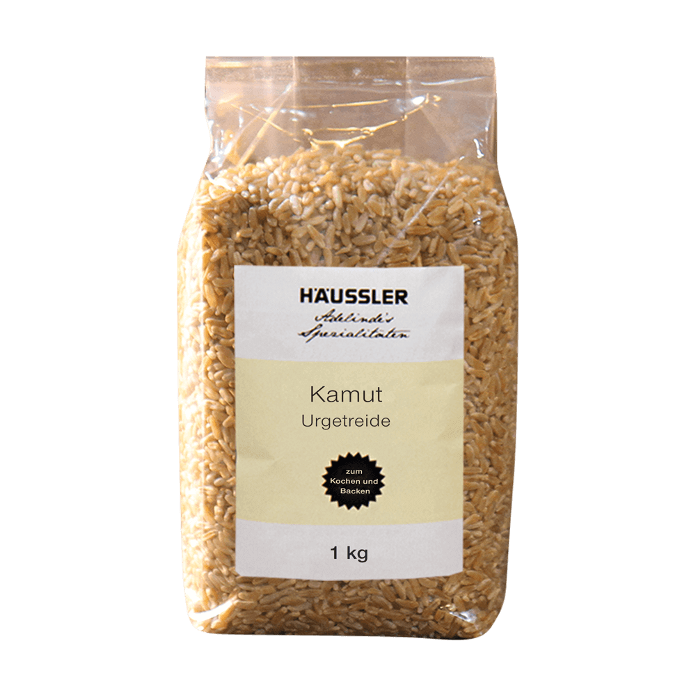 Kamut ganzes Korn Kamut ganze Körner in durchsichtiger 1 kg Verpackung ohne Hintergrund.
