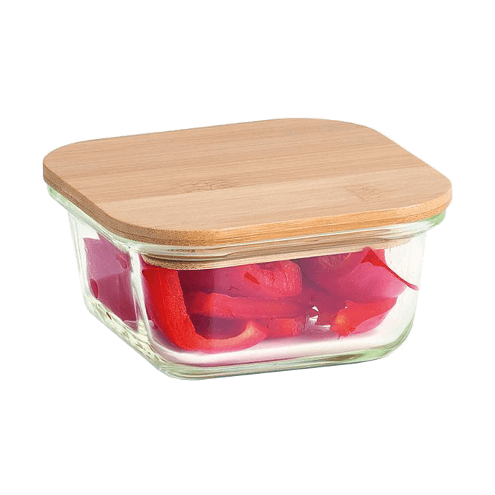 Glas-Vorratsdose mit Bambusdeckel. Es wird geschnittene Paprika darin aufbewahrt.