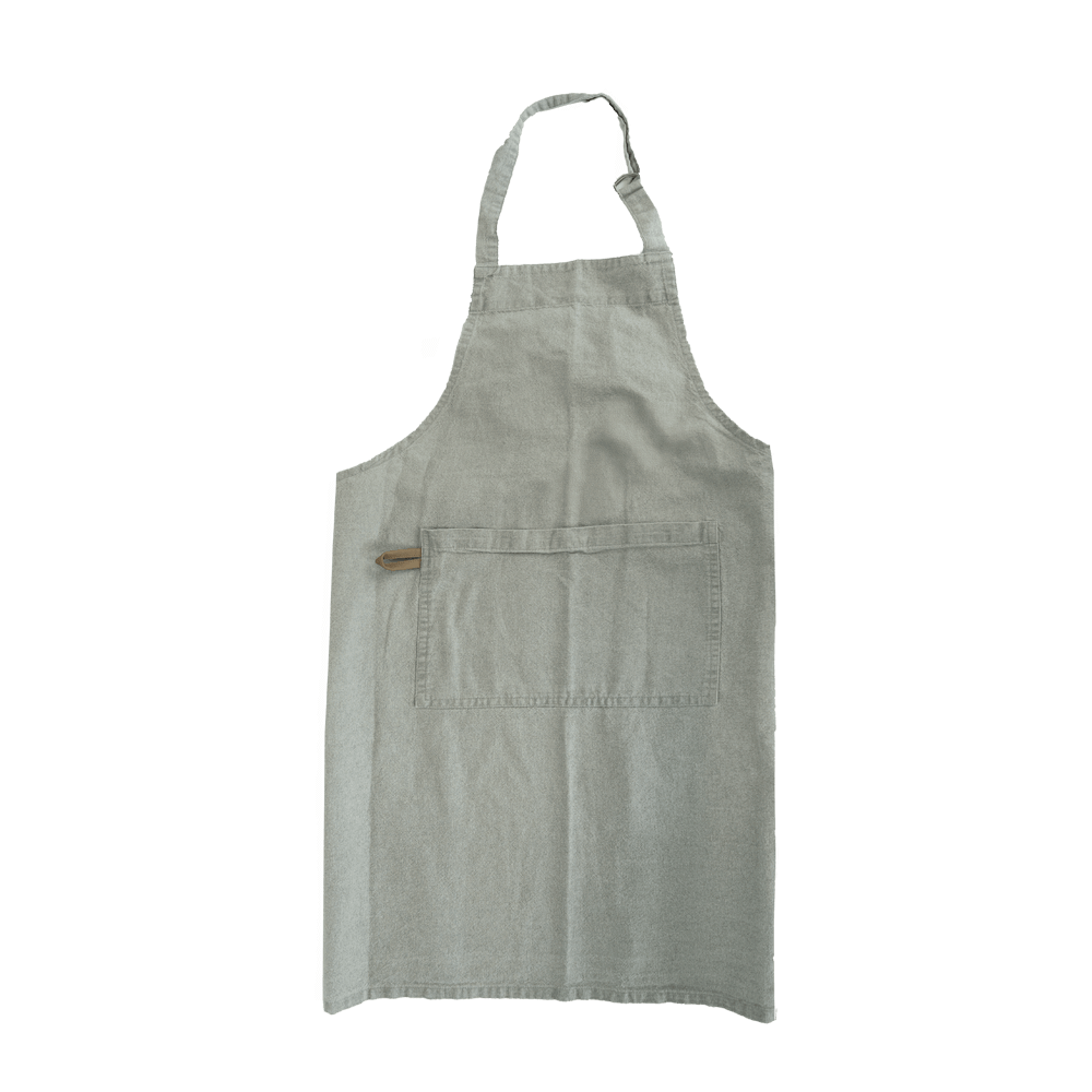 Die Schürze in der Farbe grau hat verstellbare Bänder und eine Tasche und ist ohne Hintergrund abgebildet