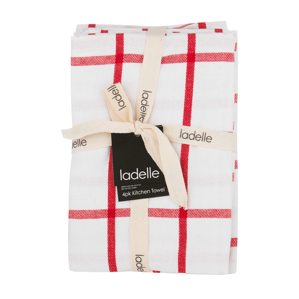 Geschirrtuch rot weiß als Geschenk gefaltet ohne Hintergrund.