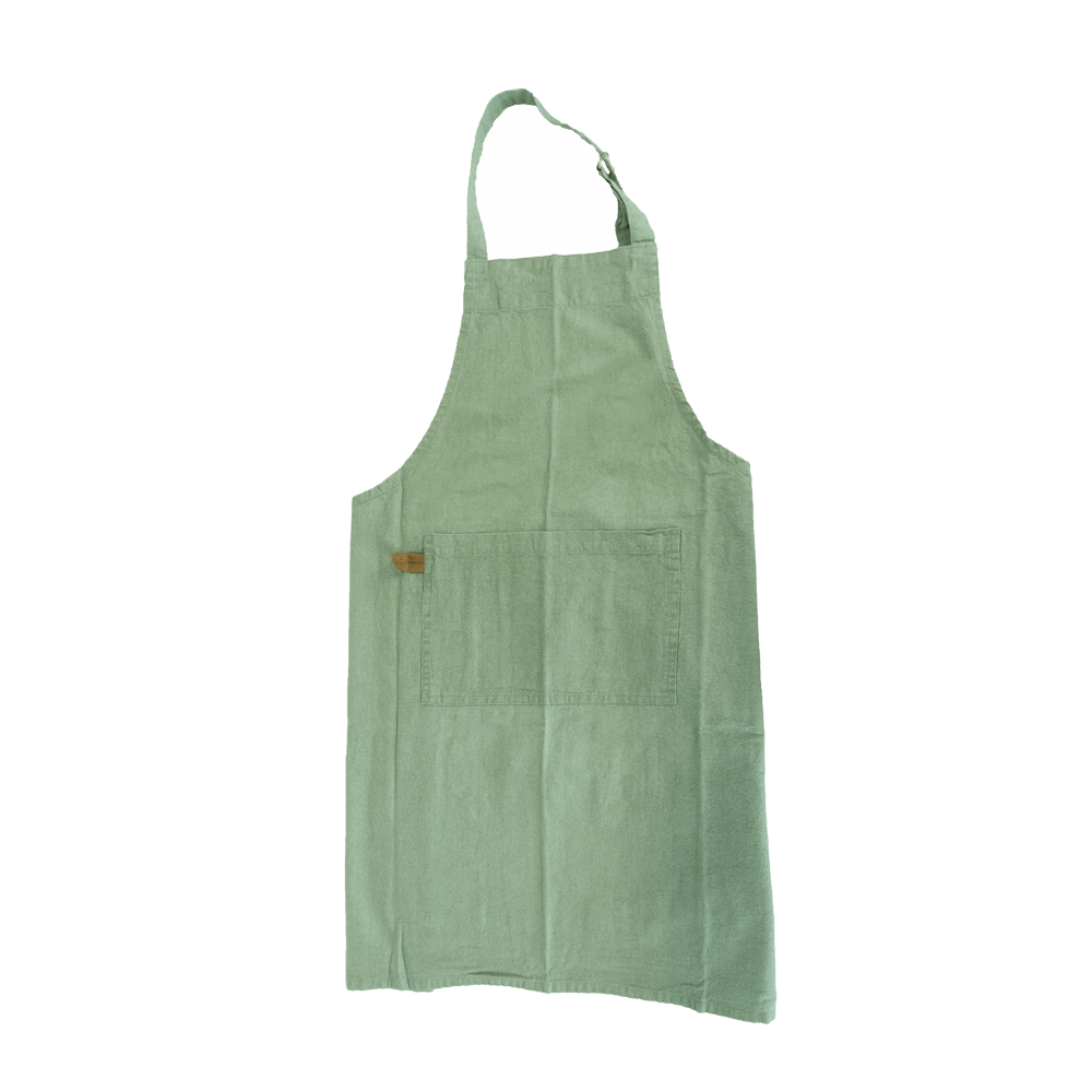 Schürze "MYRNA" grün Die Schürze in der Farbe grün hat verstellbare Bänder und eine Tasche und ist ohne Hintergrund abgebildet