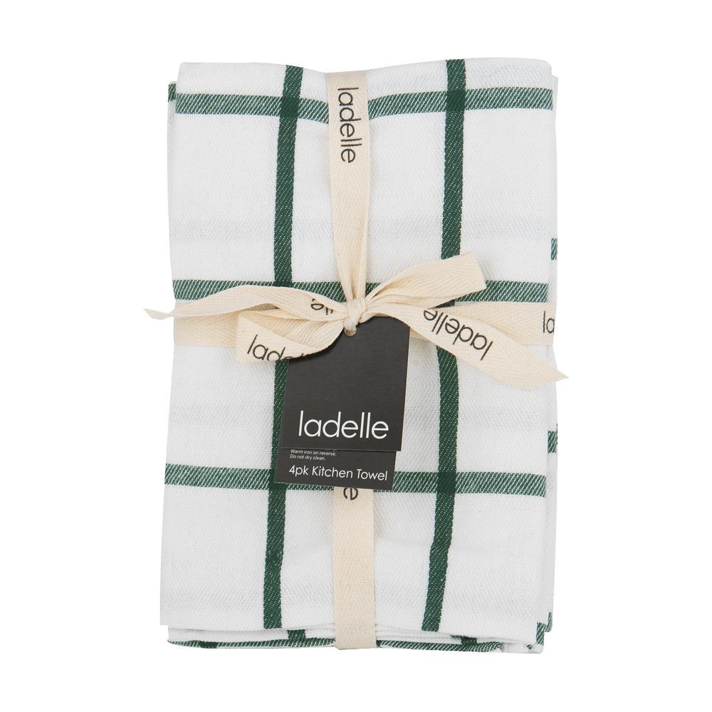 Geschirrtuch grün weiß als Geschenk gefaltet ohne Hintergrund.