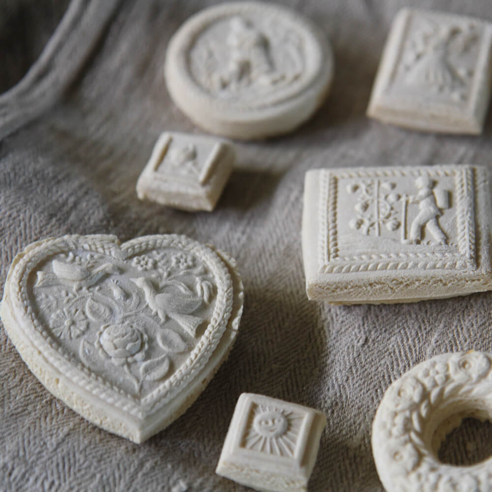 Rezept für Springerle Springerle mit verschieden Motiven wie Vögel, Blumen und Engel