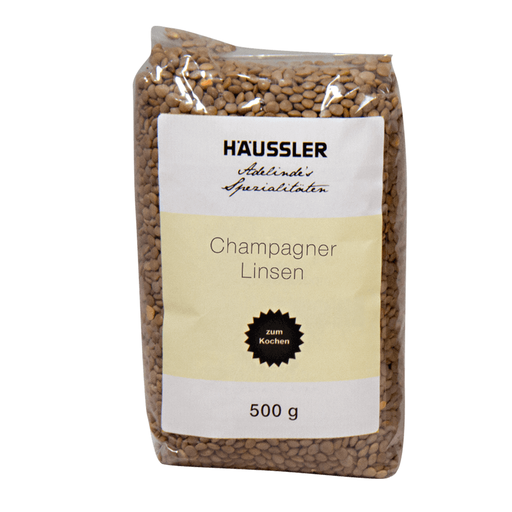 Champagner Linsen 500 g Durchsichtige Verpackung mit der Aufschrift Champagner Linsen 500 Gramm