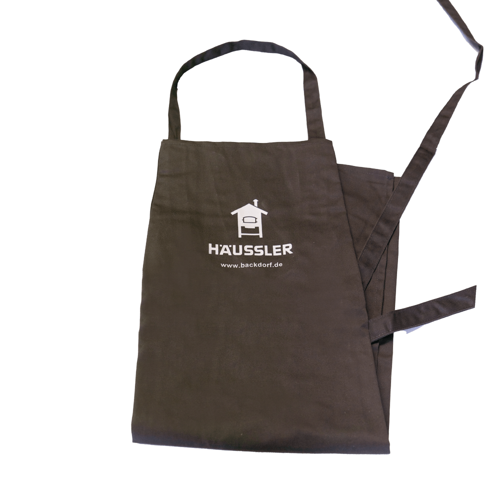 Häussler Schürze, dunkelbraun auseinandergefaltete. dunkelbraune Häussler-Schürze mit Häussler Logo und Backhäuschen Illustration