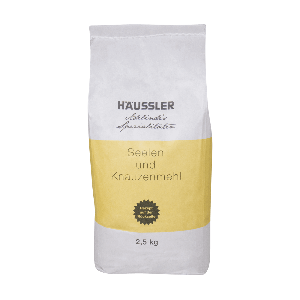 Seelen- und Knauzenmehl 2,5 kg Seelen- und Knauzenmehl in einer 2,5 kg- Papierverpackung mit gelber Banderole ohne Hintergrund.