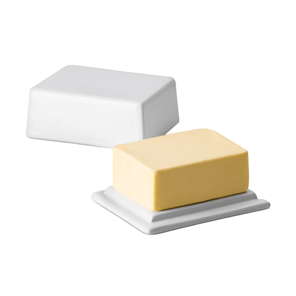 Weiße Butterdose mit Butter darin ohne Hintergrund. Der Deckel liegt daneben.