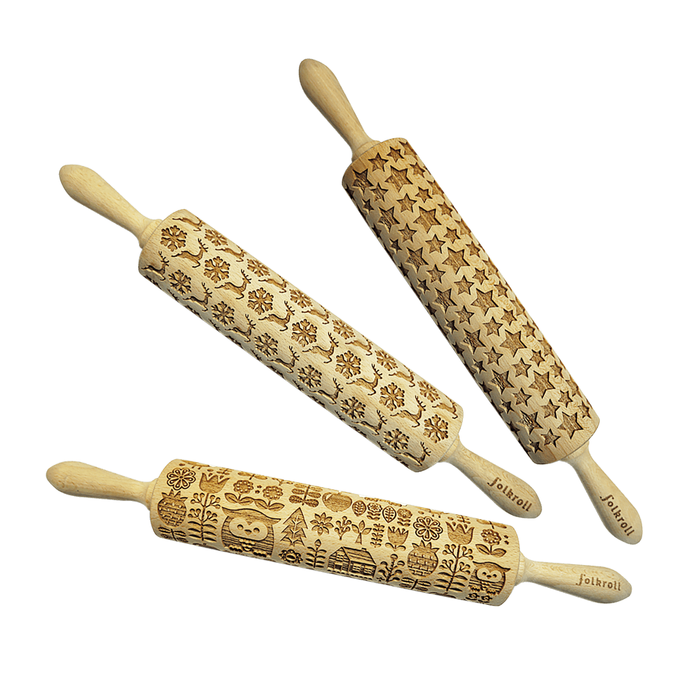 Drei verschiedene Teigroller mit weihnachtlichem Muster