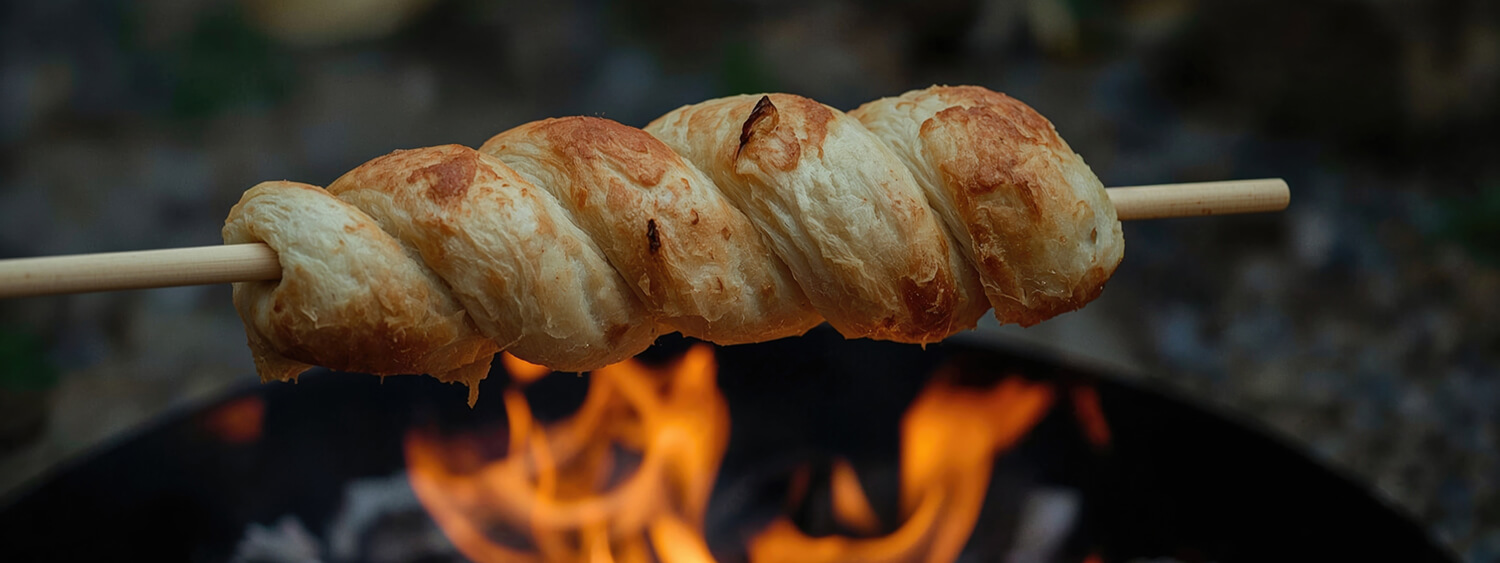 Stockbrot Stockbrot mit Feuer