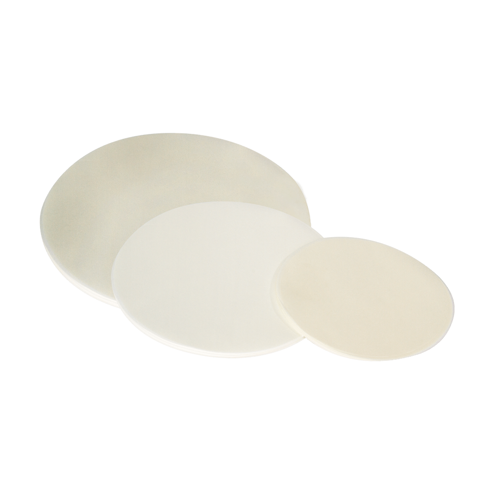 Backpapier Rund Weißes, rundes Backpapier in drei verschiedenen Größen ohne Hintergrund.