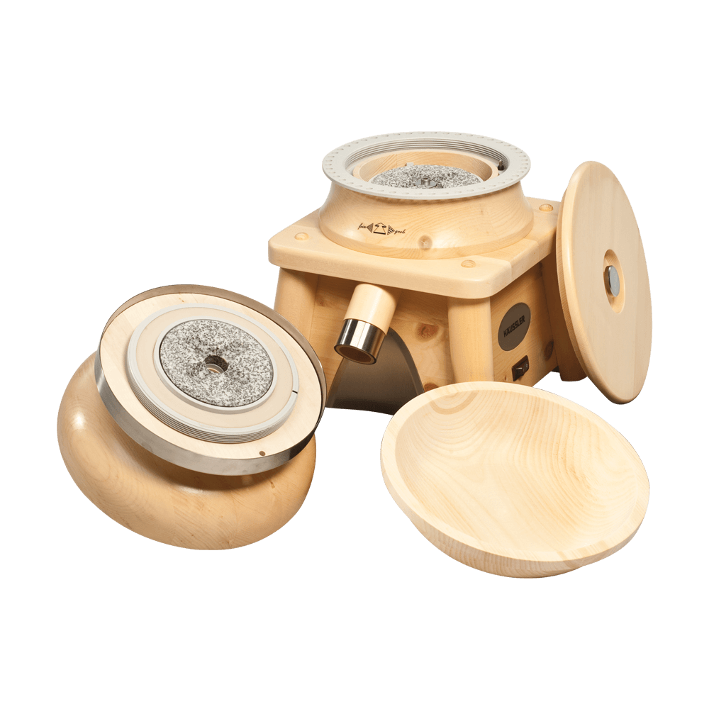 Getreidemühle Erica geöffnet, Steinmahlwerk aus Keramik und Korund sichtbar