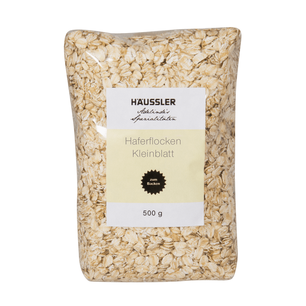 Bio-Haferflocken Kleinblatt 500 g durchsichtige Verpackung mit Körner Flocken als Inhalt und einem gelben Aufkleber mit der Aufschrift Haferflocken Kleinblatt 500 Gramm