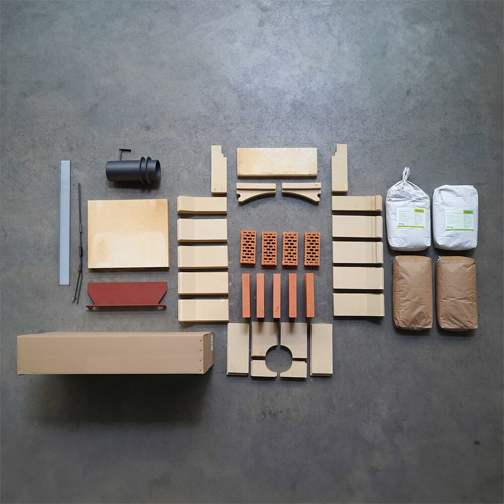 Komponenten HABO Bausatz Bausatzkomponenten des HABO 10 und 15 auf einer schwarzen Arbeitsplatte