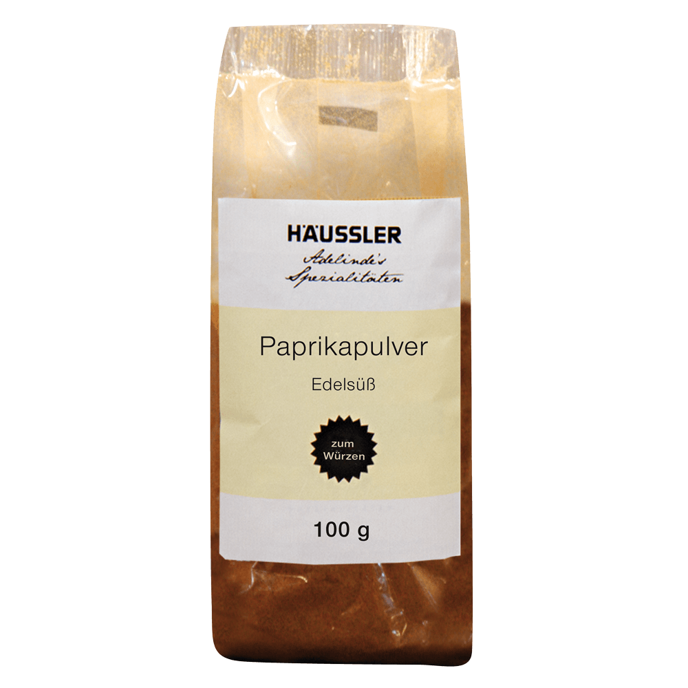 Paprikapulver edelsüß, gemahlen 100g durchsichtiges Päckchen, gefüllt mit rotem Pulver und mit Aufkleber Paprikapulver edelsüß 100g