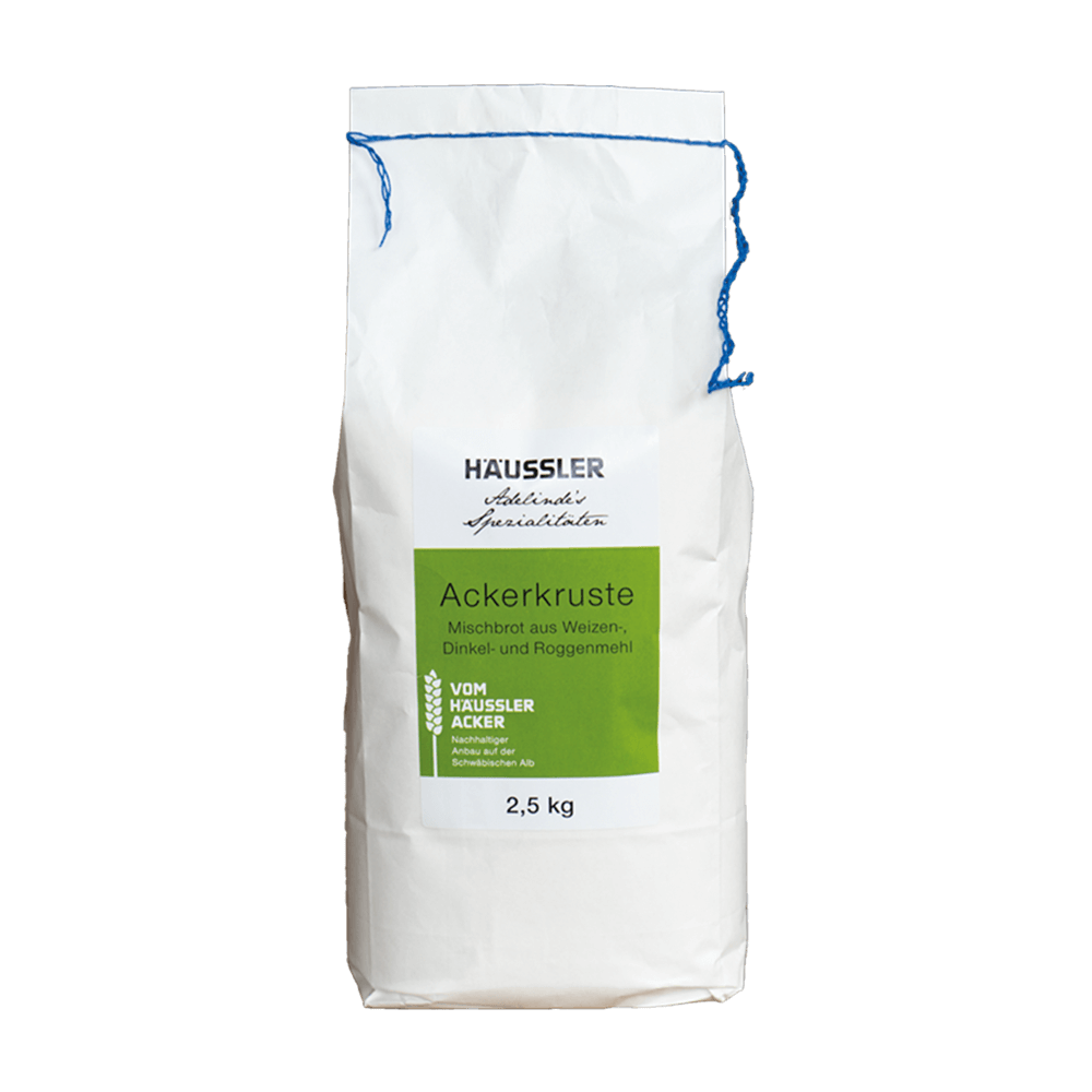 Weiße Verpackung mit grünem Aufkleber - Backmischung 2,5 kg, Ackerkruste vom Häussler Acker